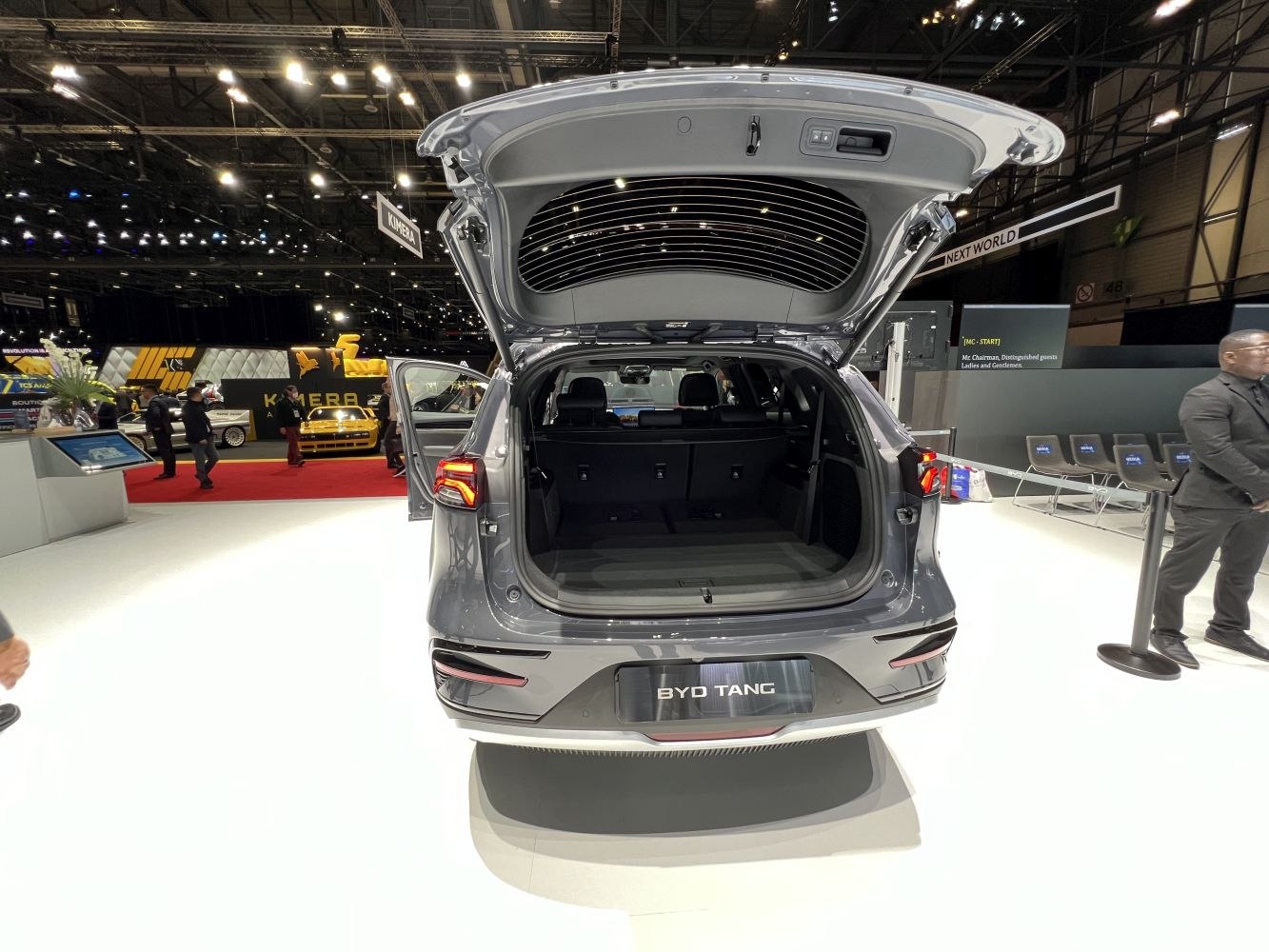 Spacious SUV trunk open with rear interior and tailgate view