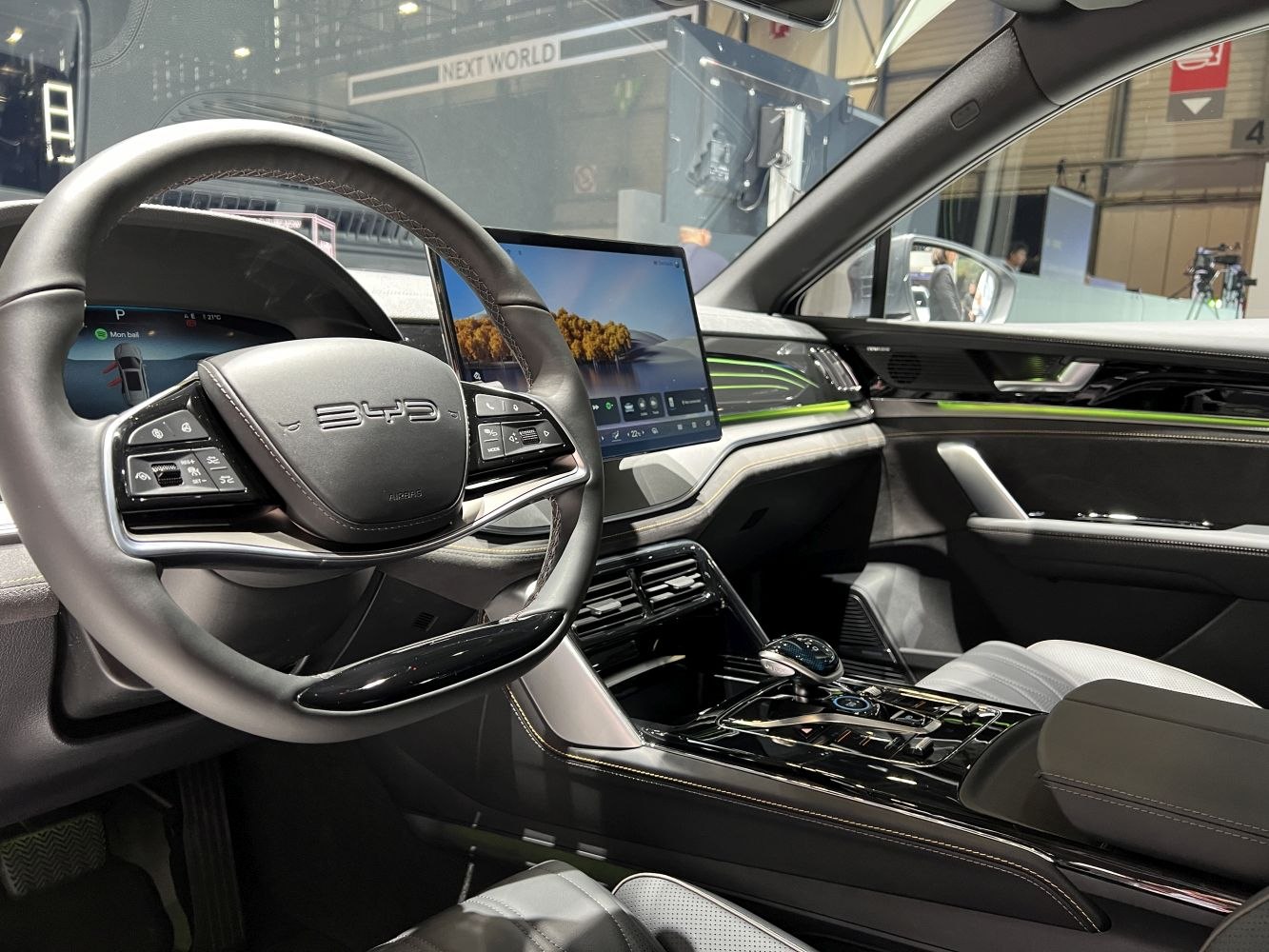 Modern digital dashboard and touchscreen infotainment with stylish steering wheel