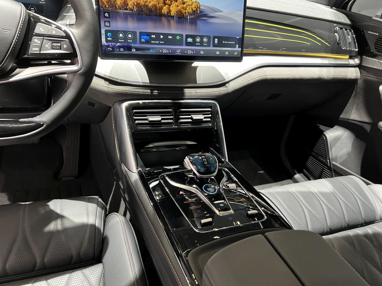 Digital gear selector and large touchscreen central display in car interior