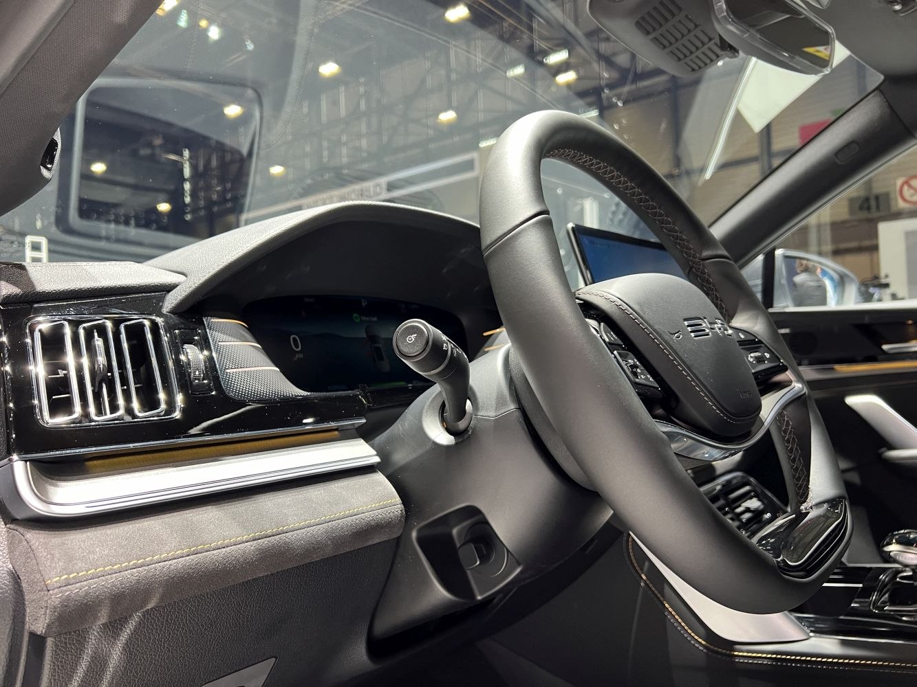 Luxury steering wheel and digital dashboard in car interior