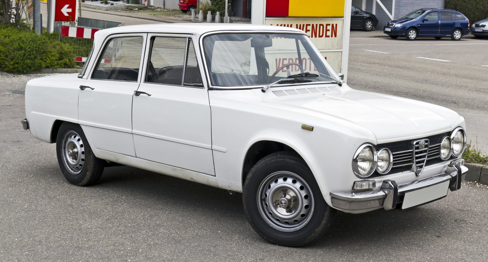 Quad round headlights and steel wheels on vintage classic car