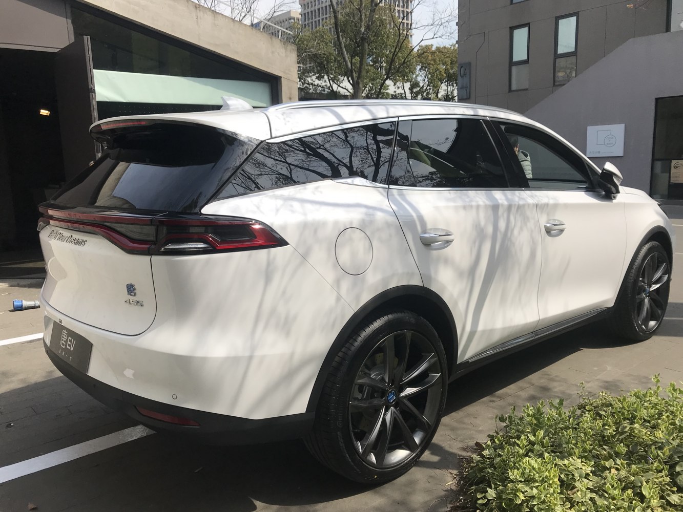 Rear and side profile with tinted windows and alloy wheels