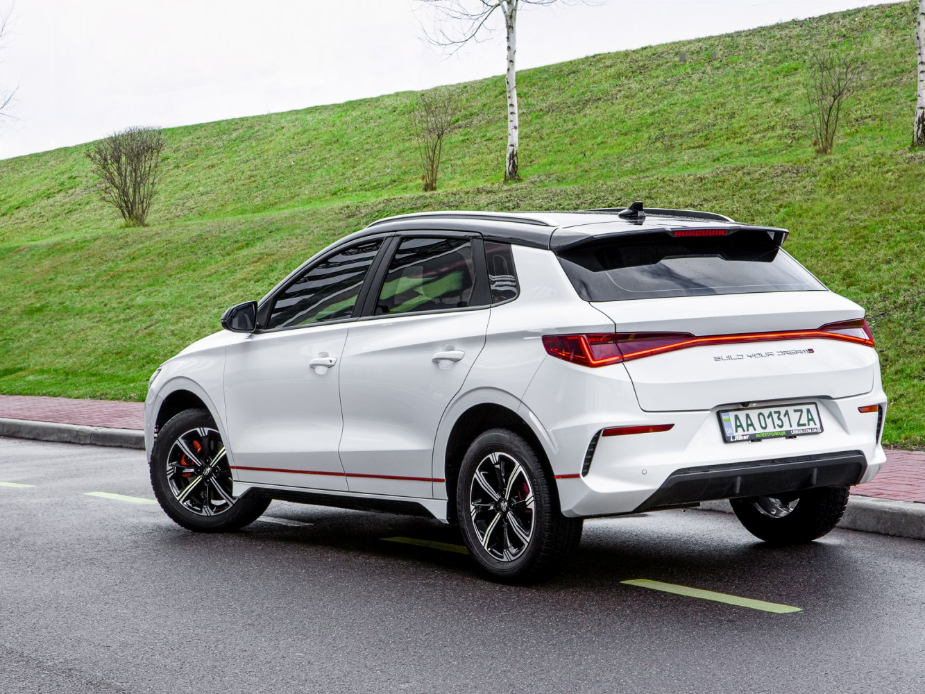Rear and side view of electric hatchback with LED taillights