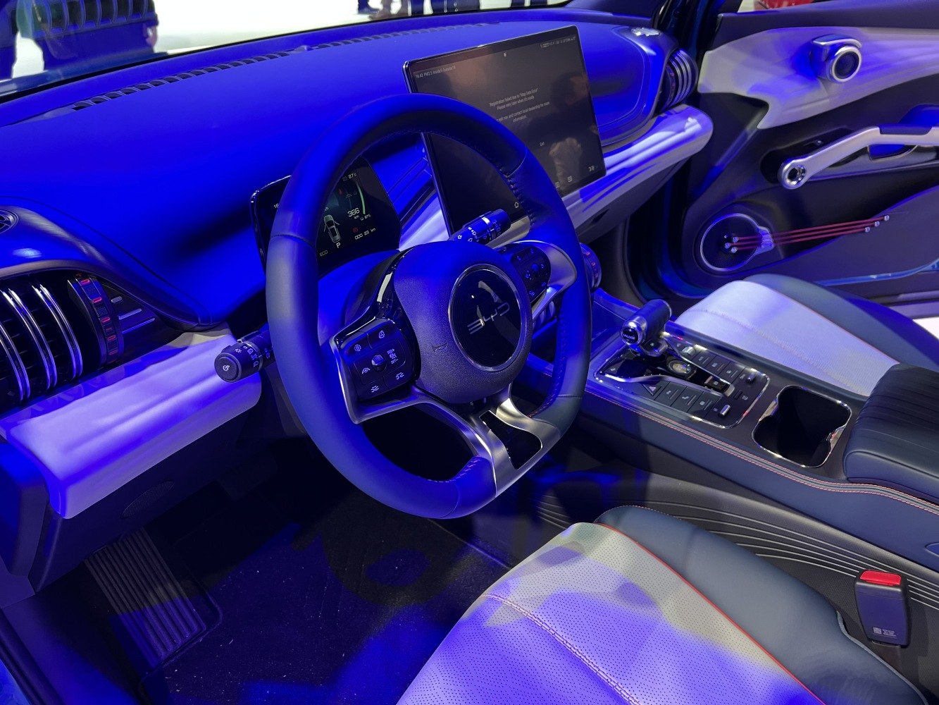 Digital dashboard and touchscreen center console inside car cabin