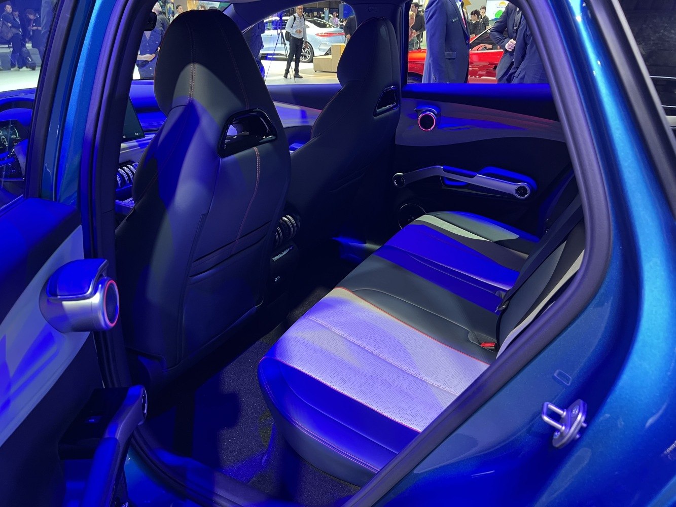 Rear interior with leather seats and modern door panel design