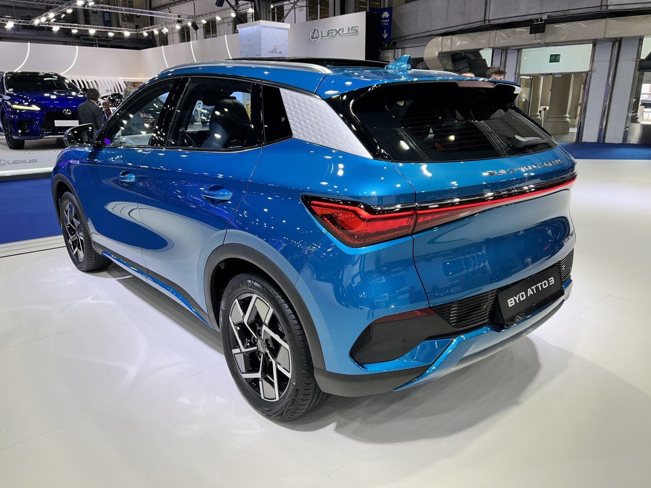 Rear and side view of a modern electric SUV with distinctive taillights and alloy wheels
