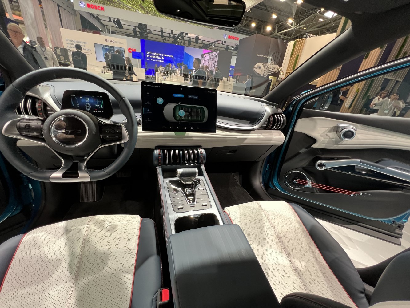 Digital dashboard, touchscreen display, steering wheel, modern car interior
