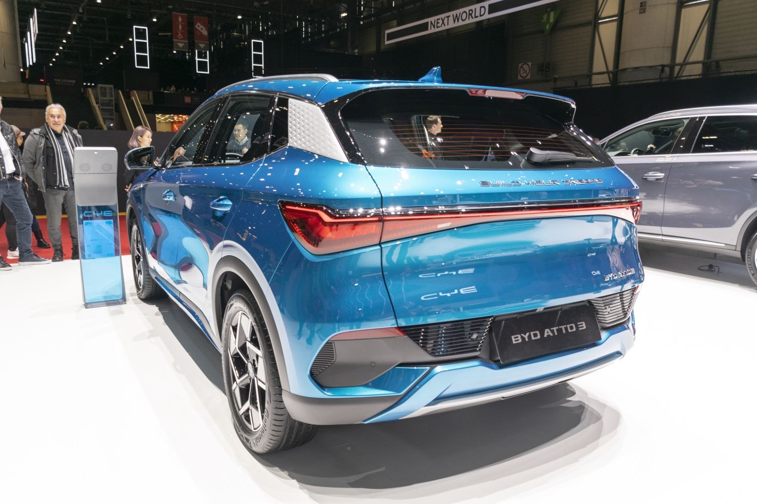 Rear and side view of a modern electric SUV with LED taillights and alloy wheels