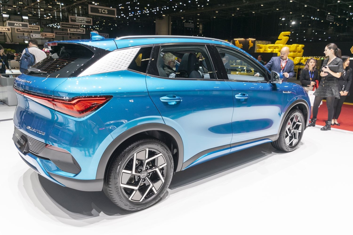 Blue electric SUV rear with alloy wheels and distinct tail light design