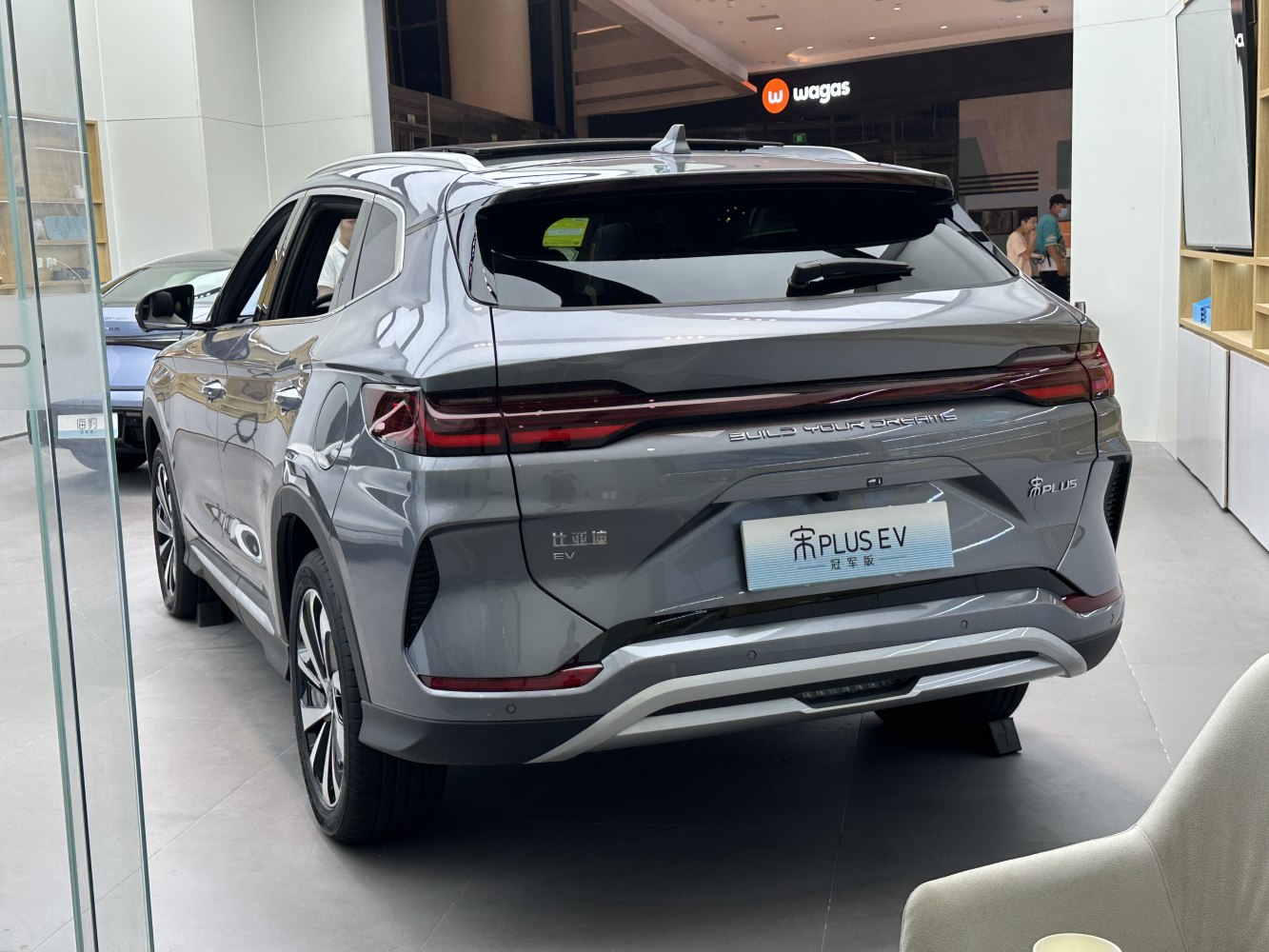 Rear design with sleek tail lights and modern bumper of electric SUV