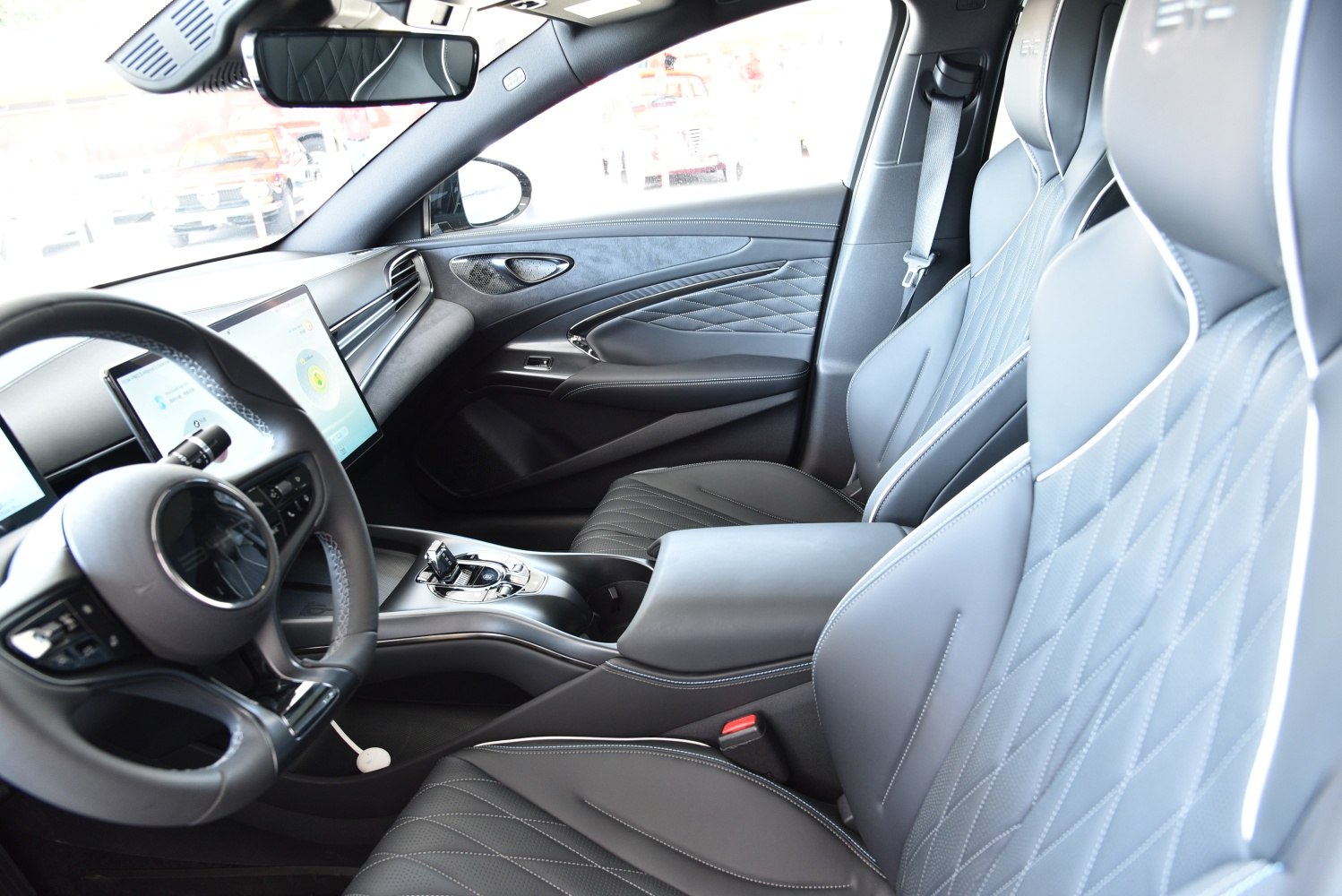 Quilted leather seats and dual digital screens