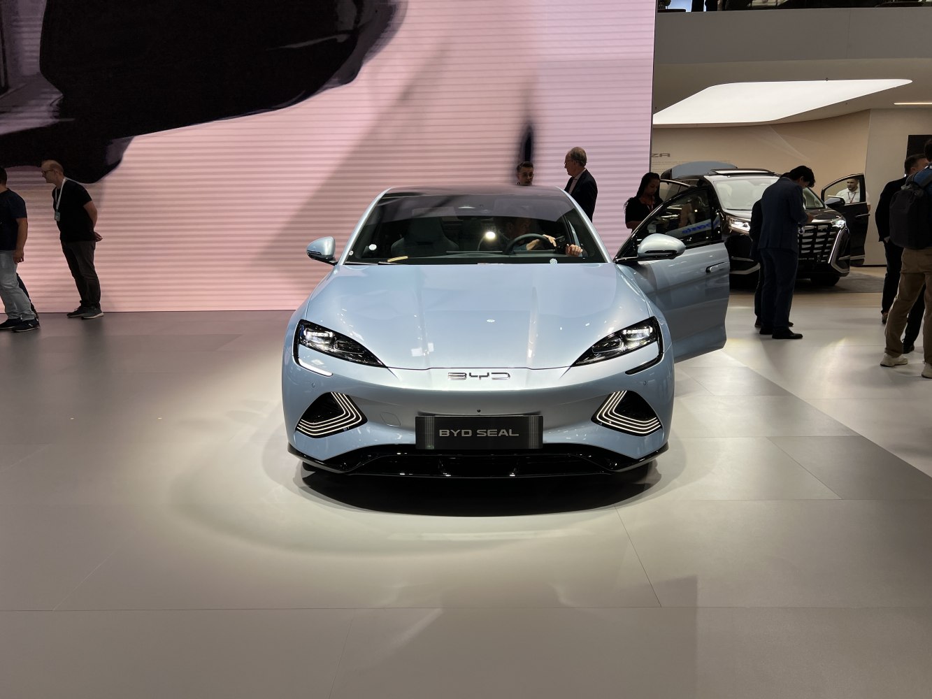 Front view with sleek LED headlights and aerodynamic front fascia