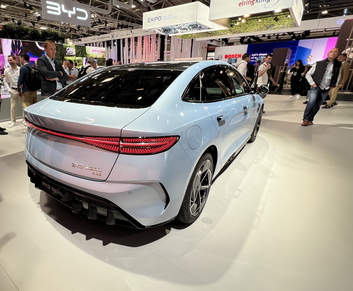 Rear view of electric sedan with full-width LED taillight and aerodynamic design