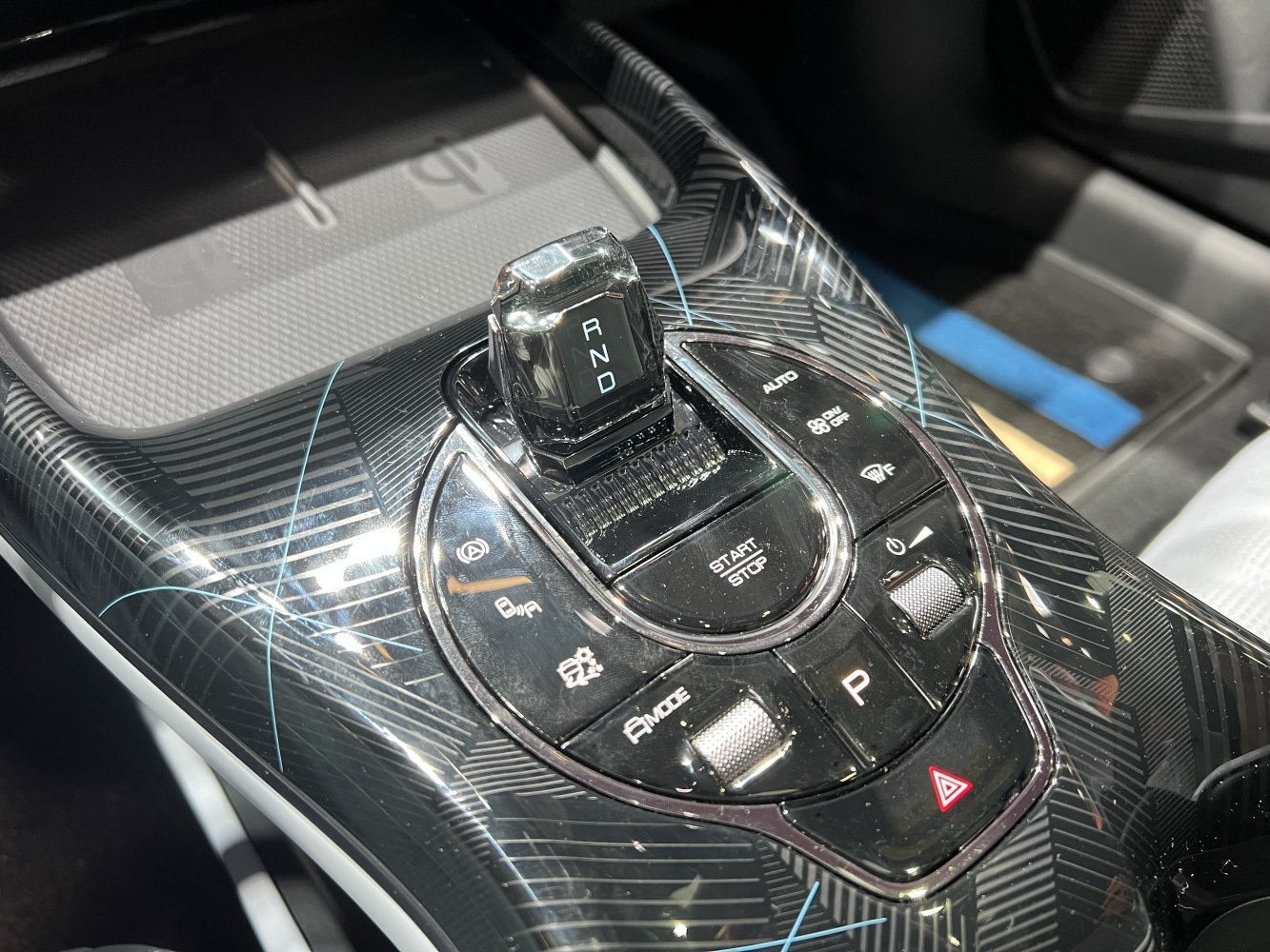 Gear selector and central control buttons with modern design