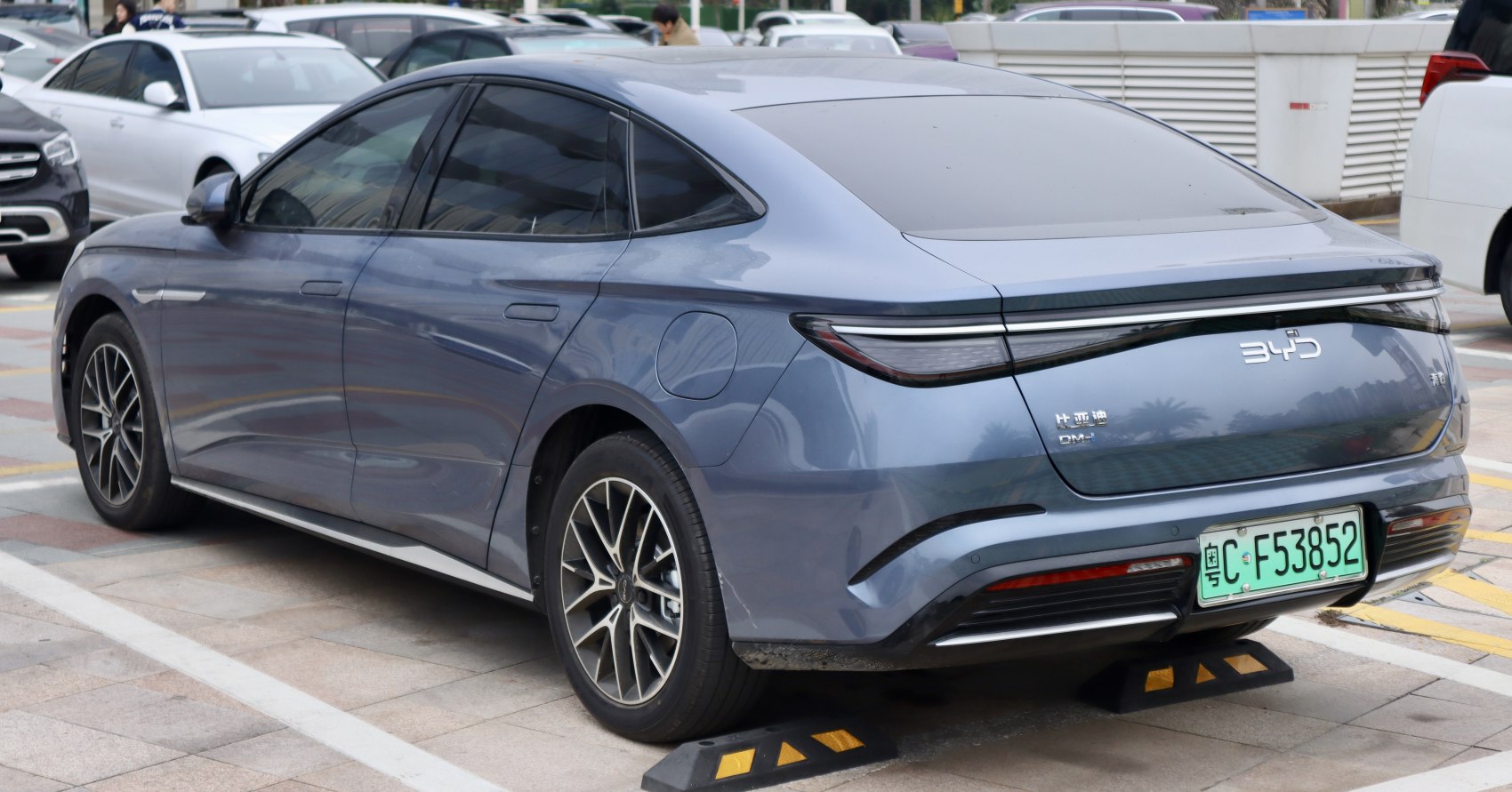 Sleek rear profile with continuous tail light and sporty alloy wheels