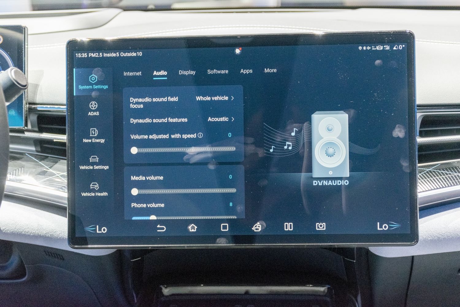 Touchscreen infotainment system with Dynaudio sound controls and vehicle settings
