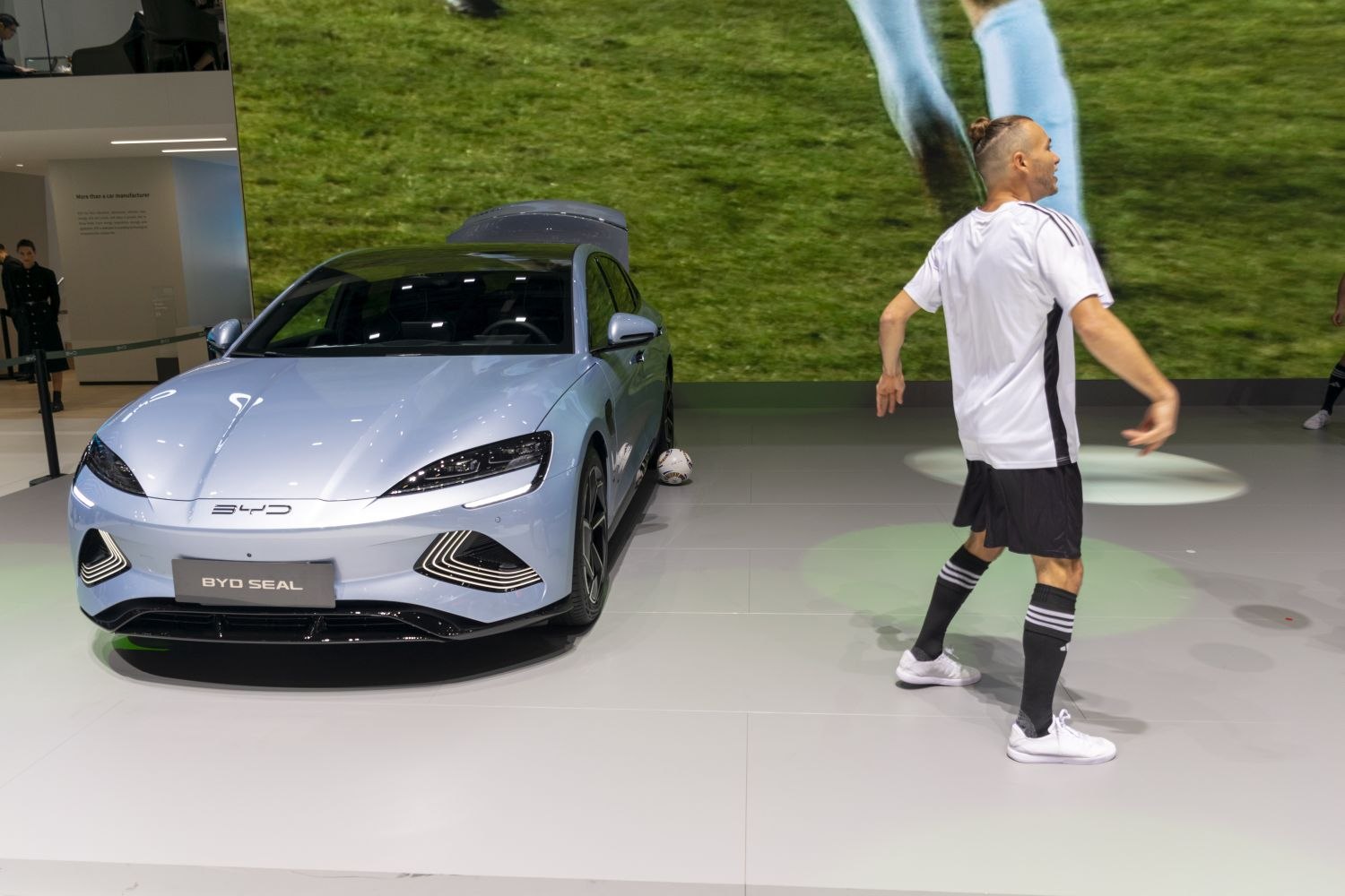 Front view of 2022 electric sedan with LED headlights and aerodynamic shape
