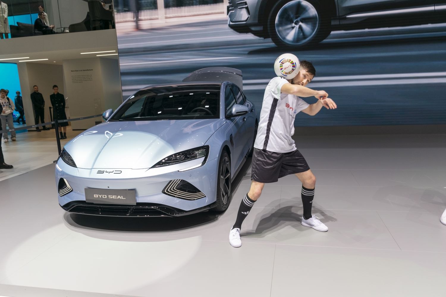 Front view of a sleek vehicle with modern LED headlights and aerodynamic design