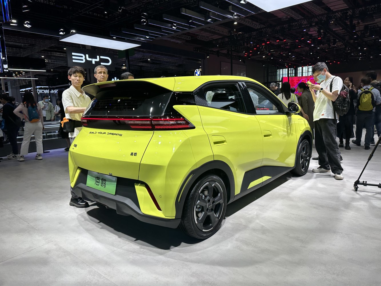 Rear view of a compact hatchback with sharp LED taillights and a two-tone body design.