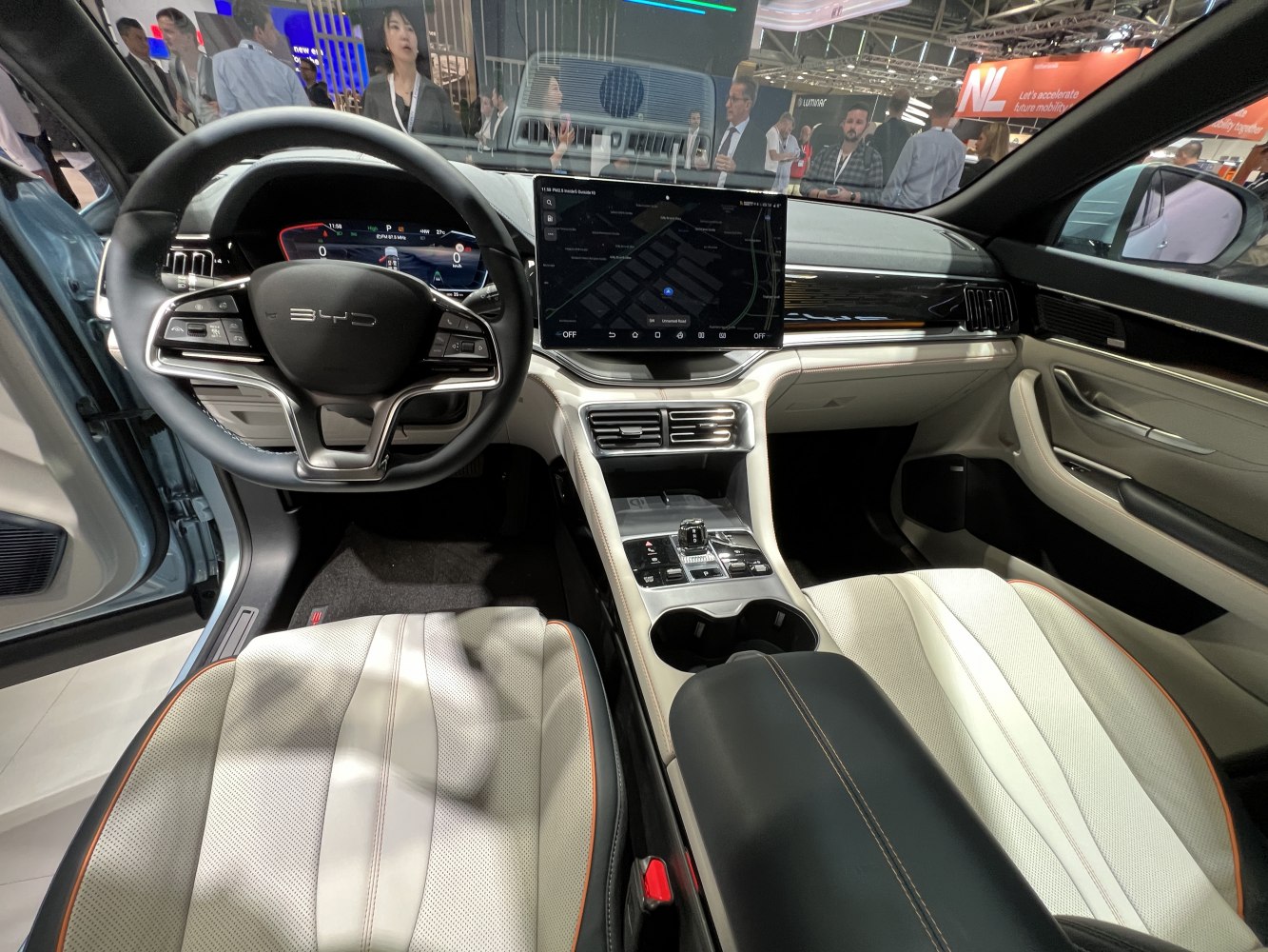 Digital instrument cluster and large central touchscreen in modern car interior