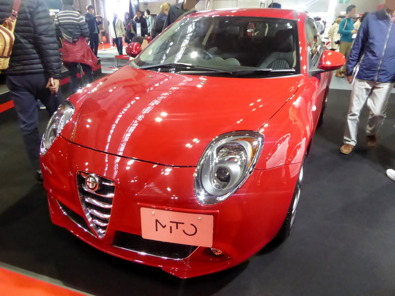 Front view showing iconic grille and round headlights