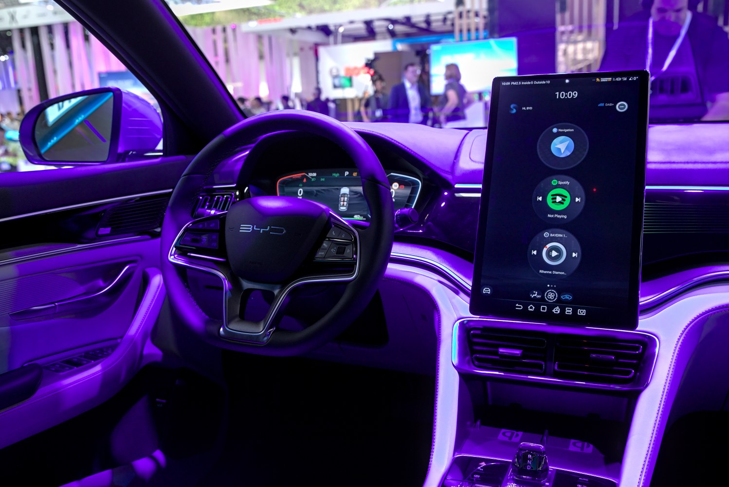 Digital gauge cluster and large vertical touchscreen infotainment