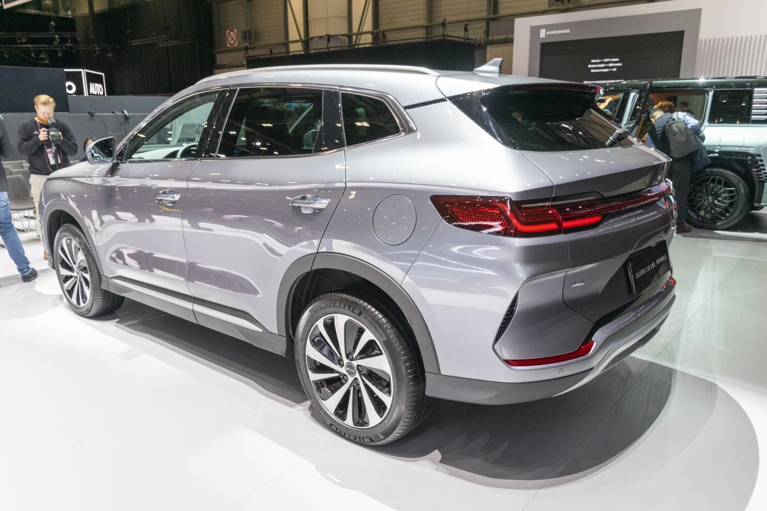 Rear side view of electric SUV with LED taillights and alloy wheels