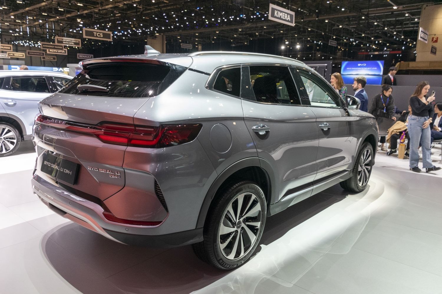 Rear 3/4 view of electric SUV with rear light bar and alloy wheels
