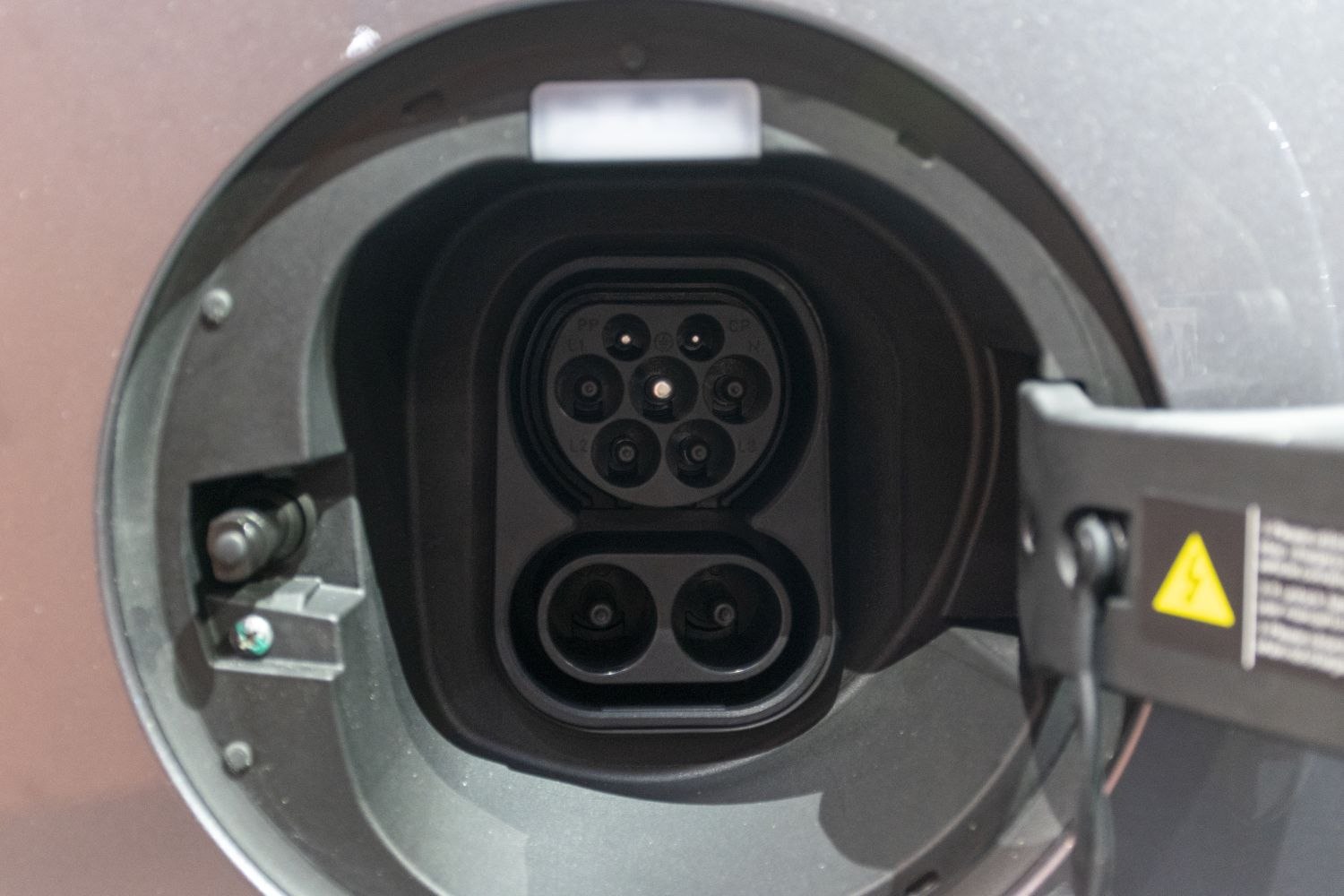 Close-up of 2024 EV charging port connector