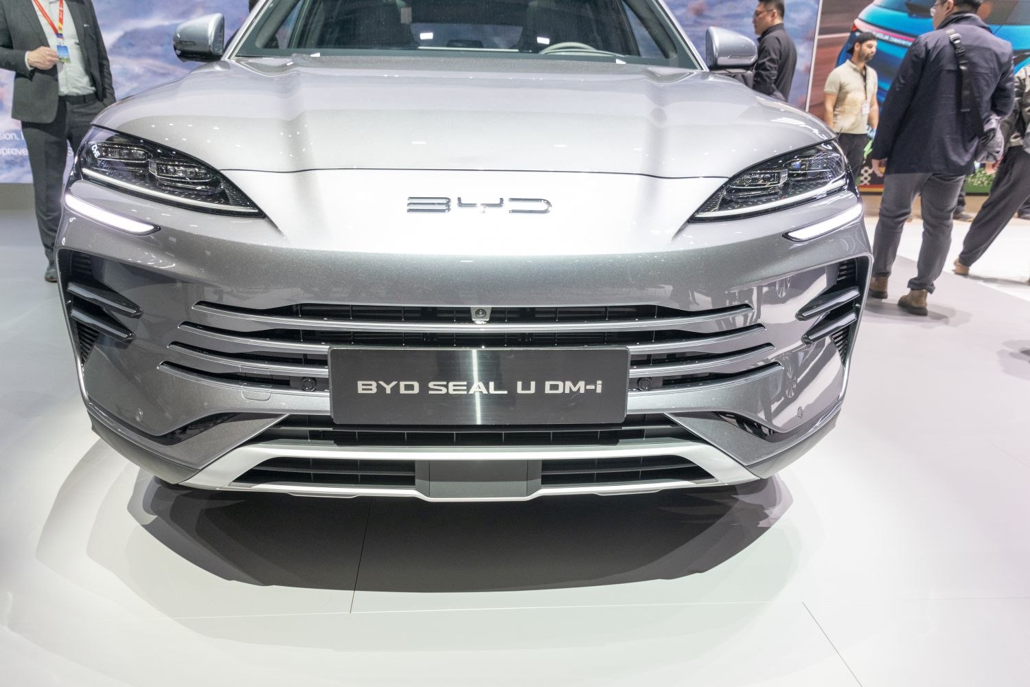 Close-up of front grille and sleek LED headlights