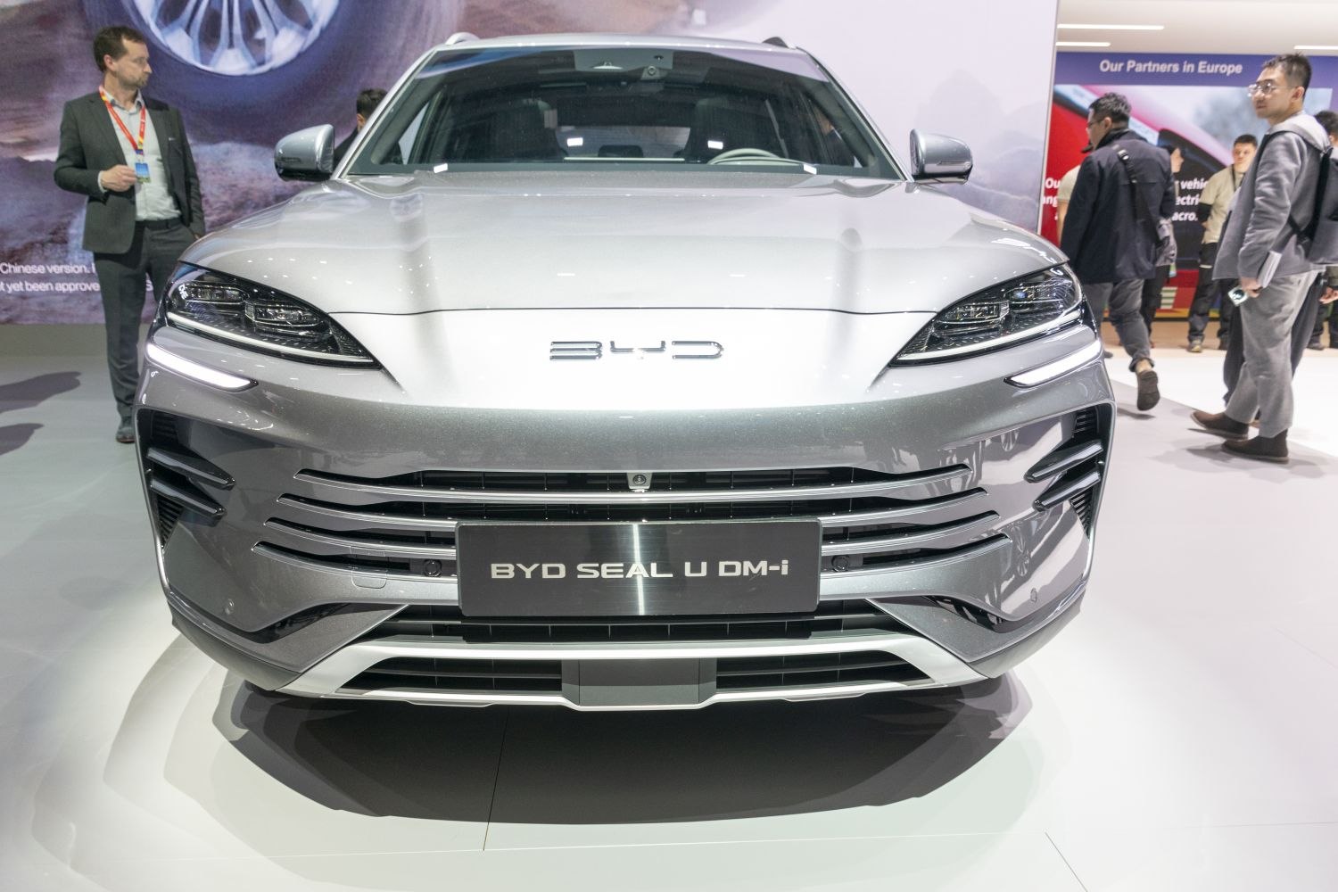 Front view with sleek LED headlights and modern grille design