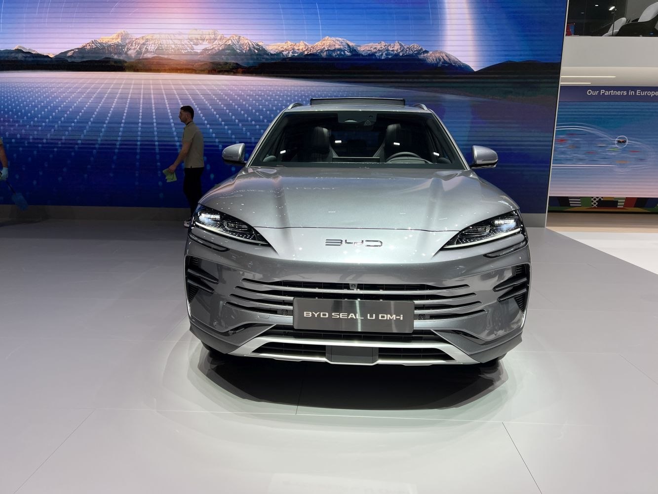 Front view with aggressive headlights and aerodynamic grille.