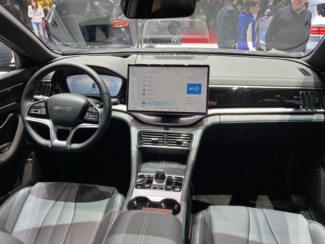 Digital dashboard and touchscreen center console with modern steering wheel and seats