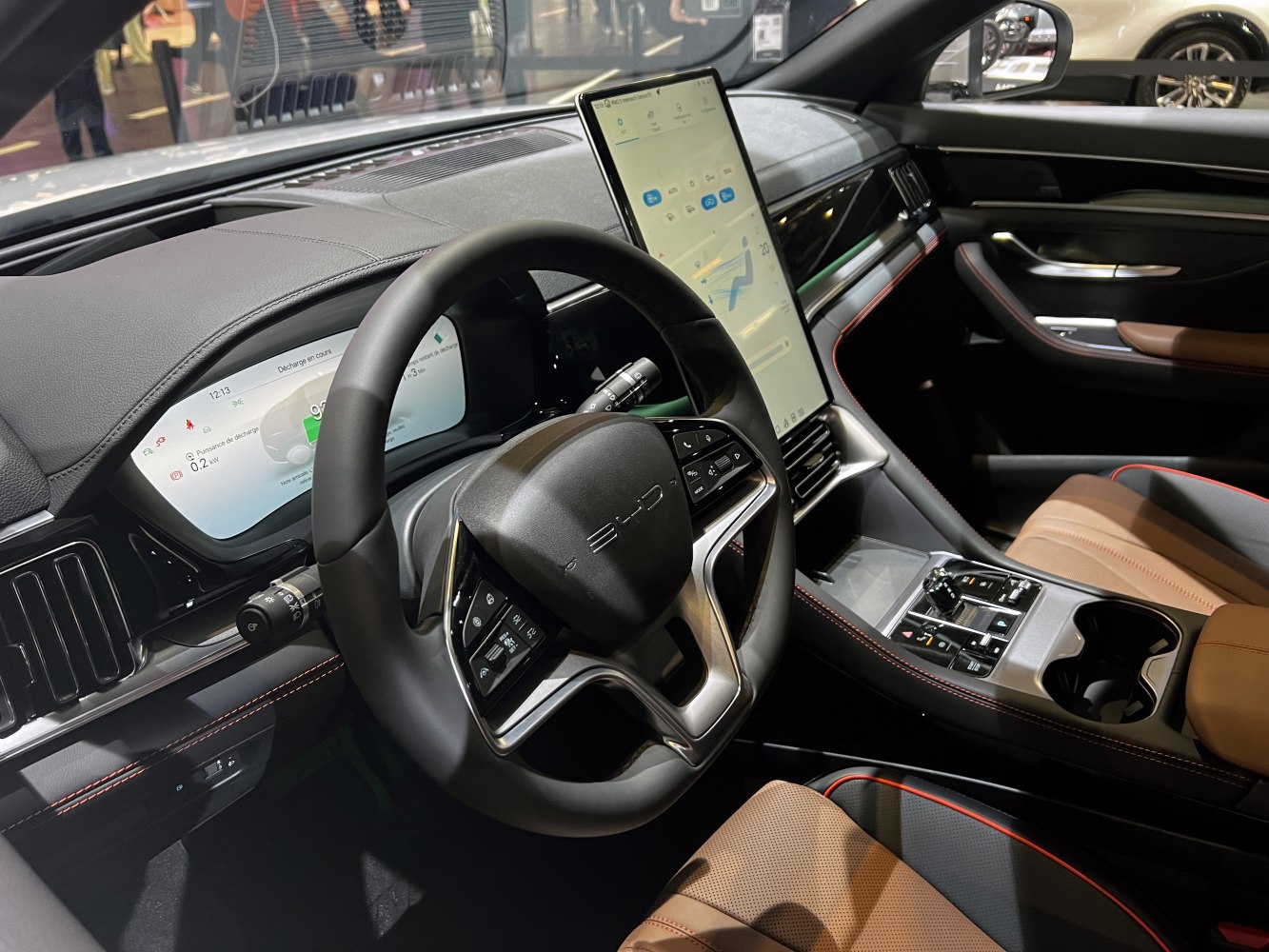 Digital instrument cluster and large touchscreen in luxury car interior