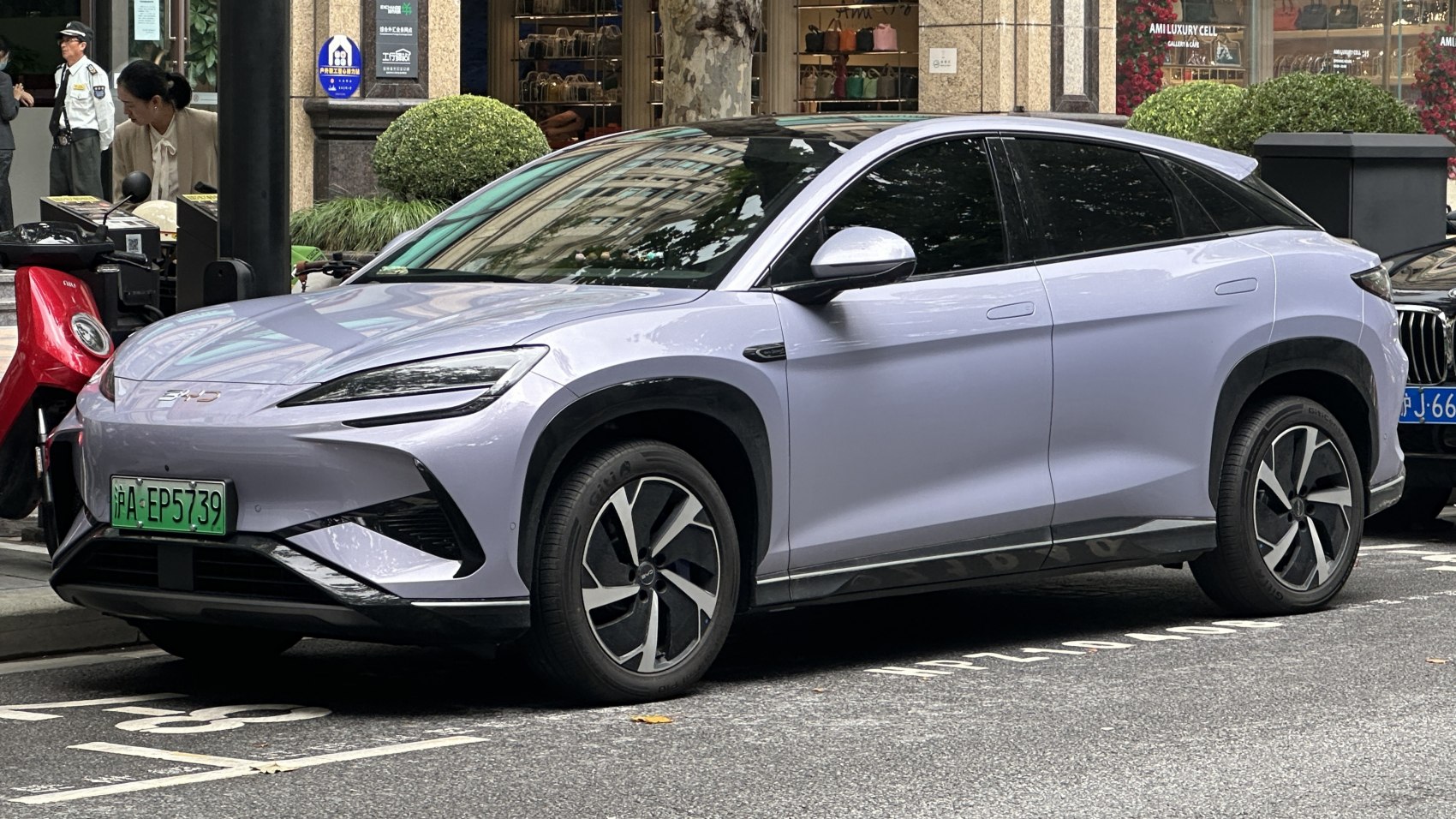 Aerodynamic electric crossover with slim LED headlights and sculpted body