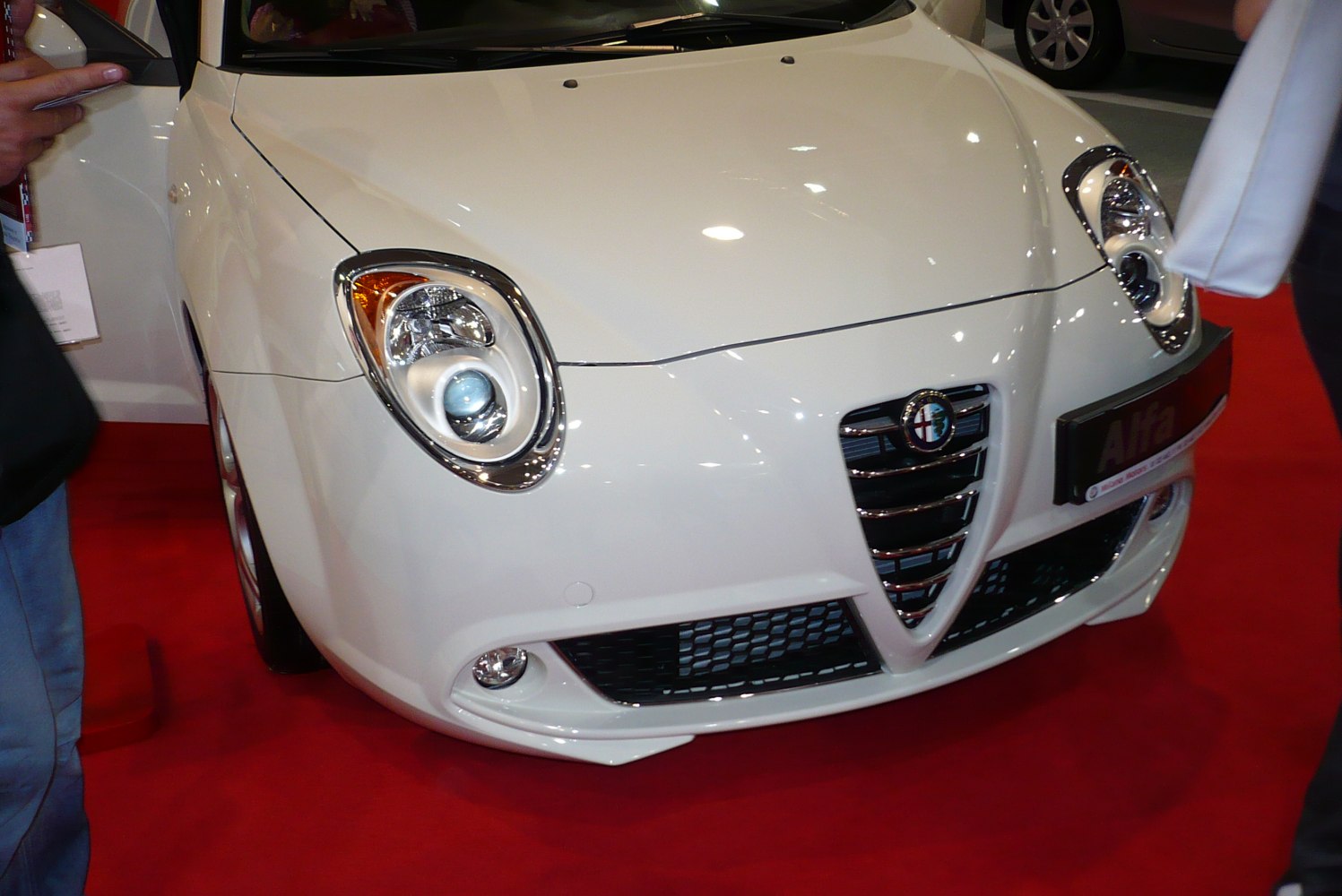 Front view showing headlights and Alfa Romeo-style grille