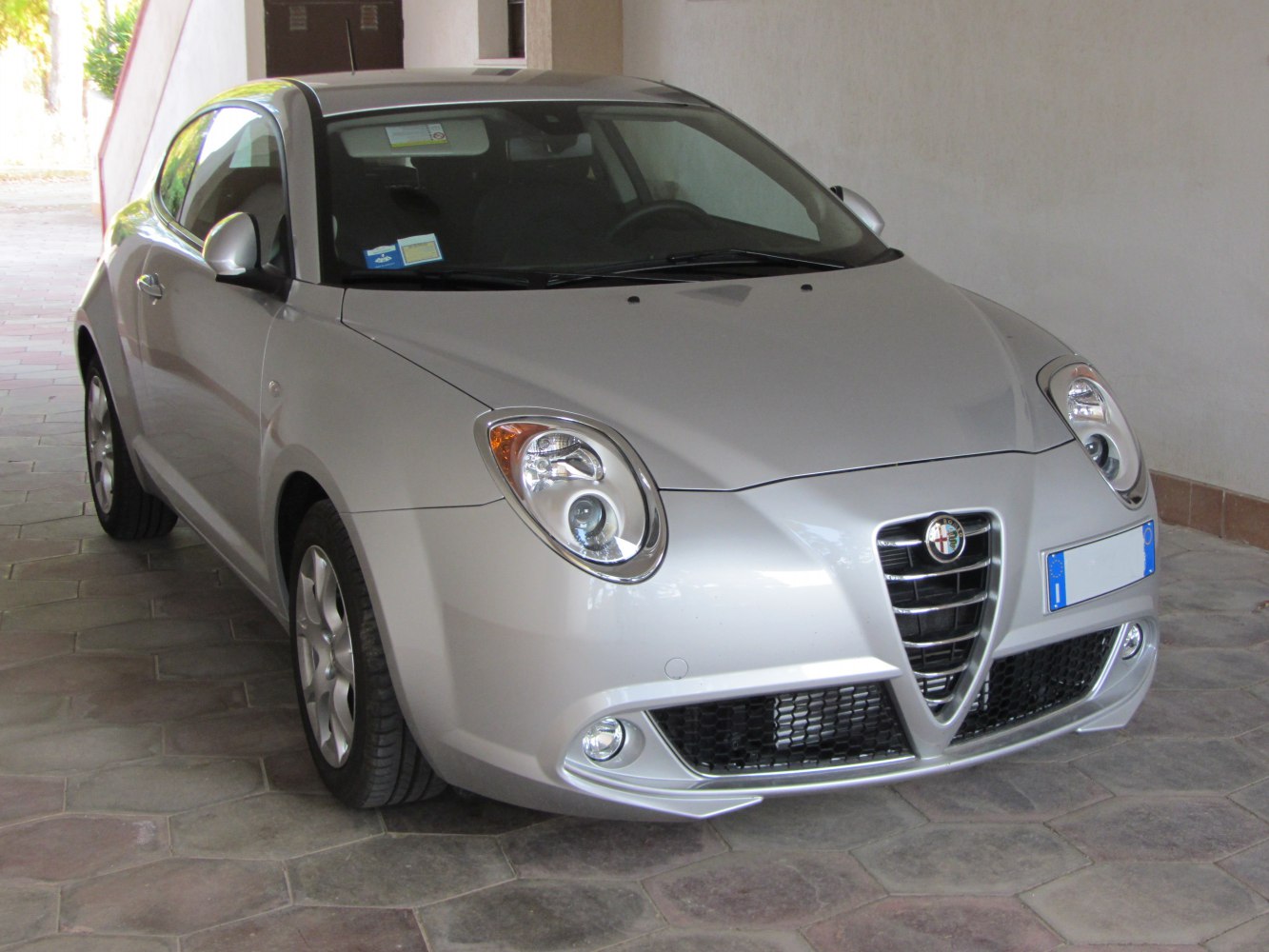 Front angled view with triangular grille and rounded headlights