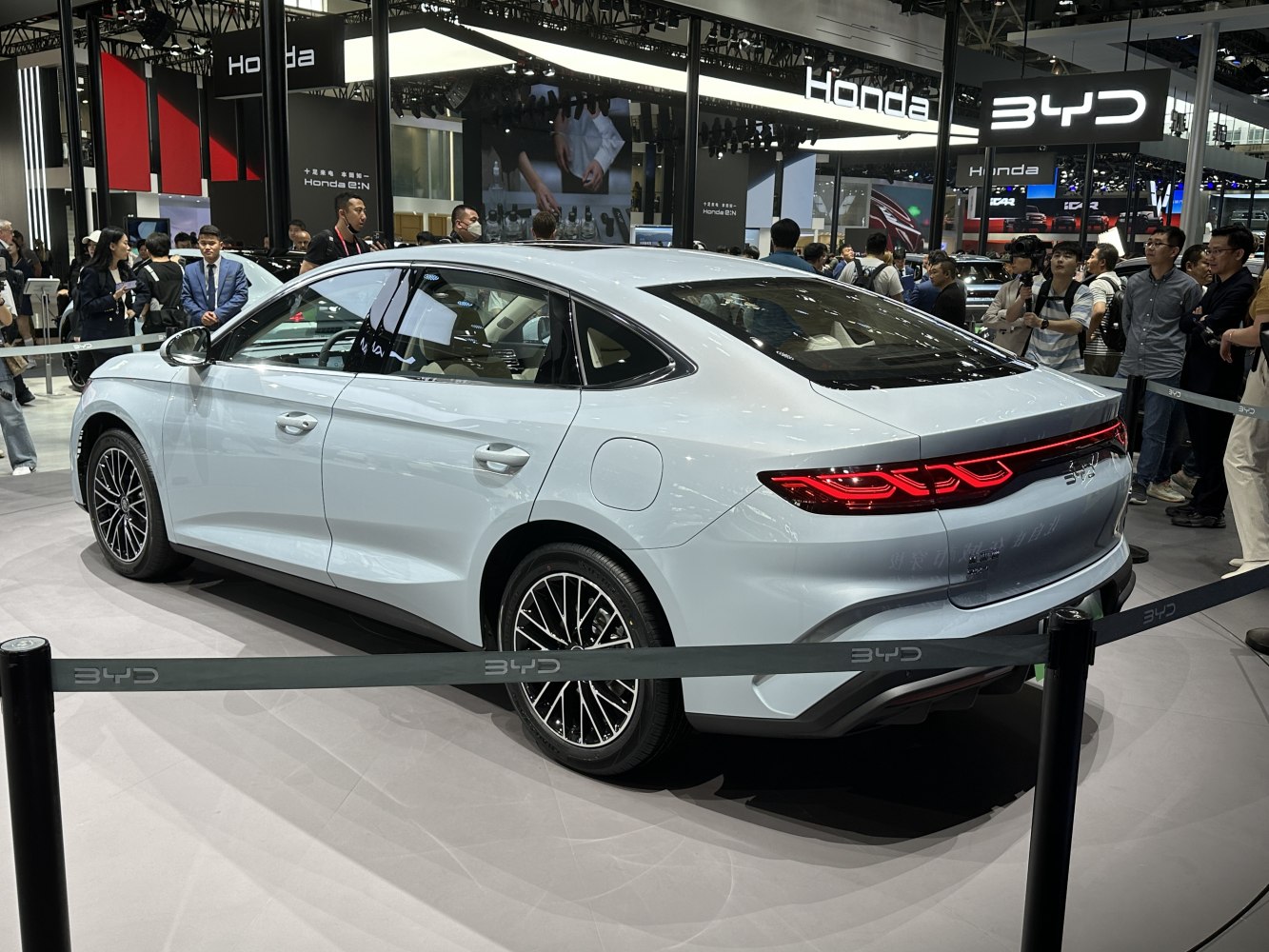Sleek rear LED lights and aerodynamic sedan side profile