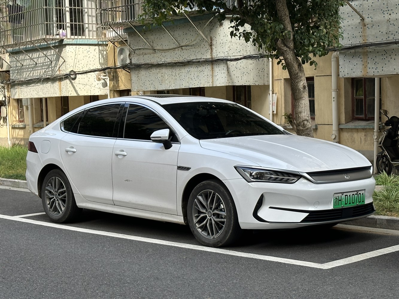 Front side profile with sleek LED headlights and aerodynamic design