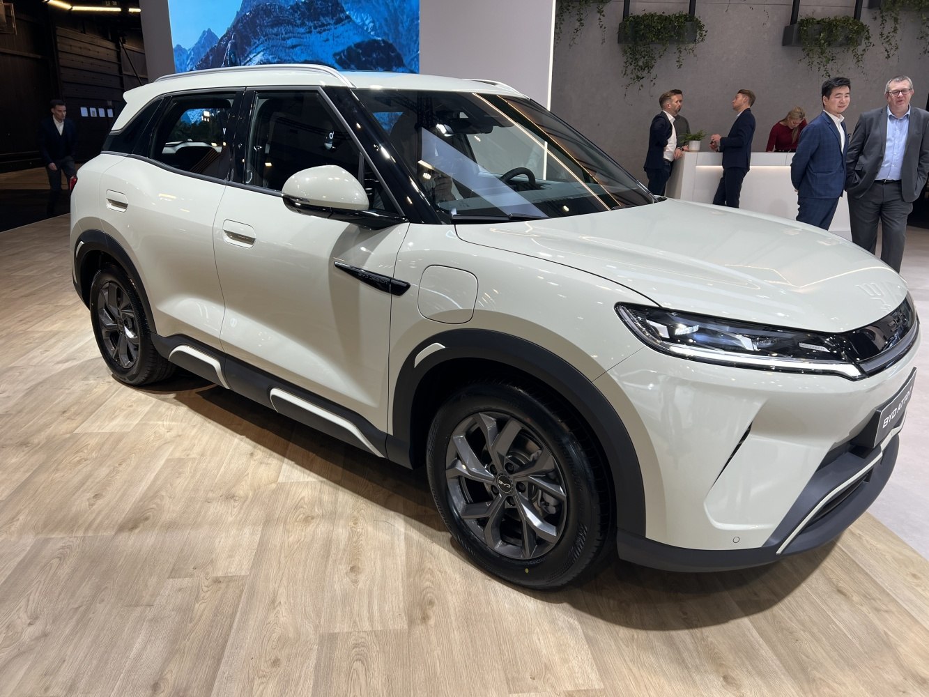 Electric SUV with slim LED headlights and multi-spoke alloy wheels