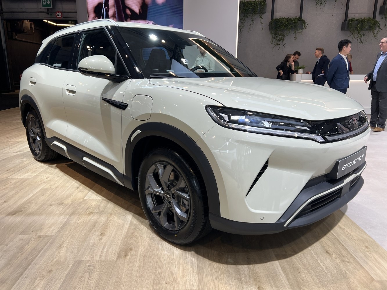 Front side view of modern SUV with LED headlights and aerodynamic body.
