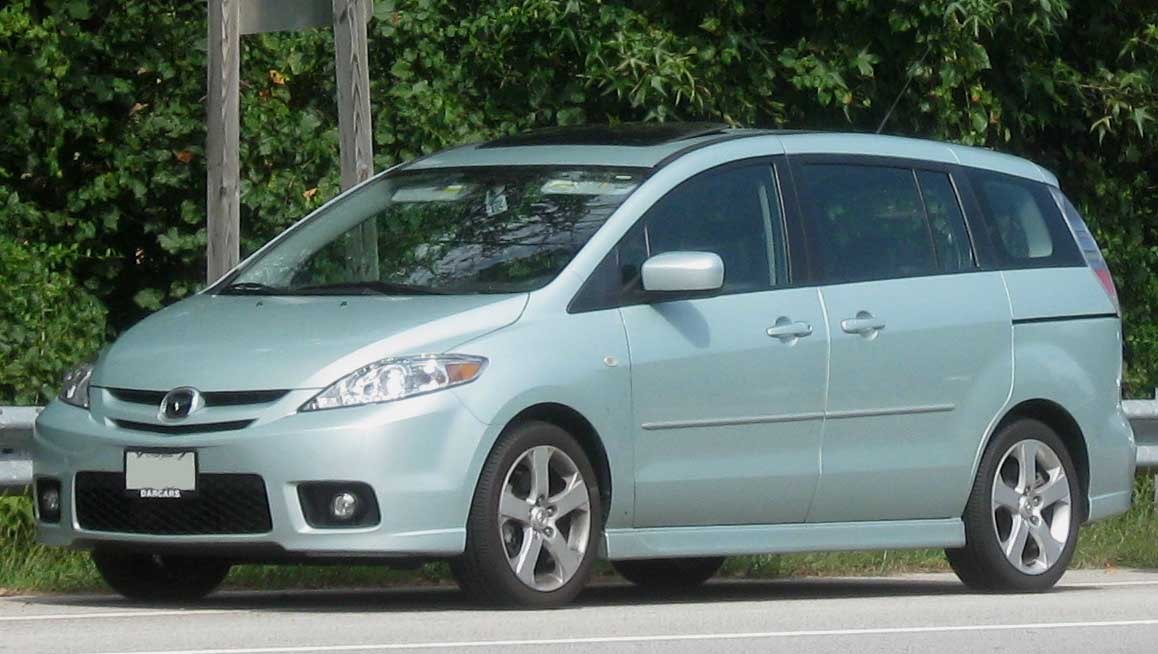Compact silver 5-door minivan with distinctive headlamps and alloy wheels.