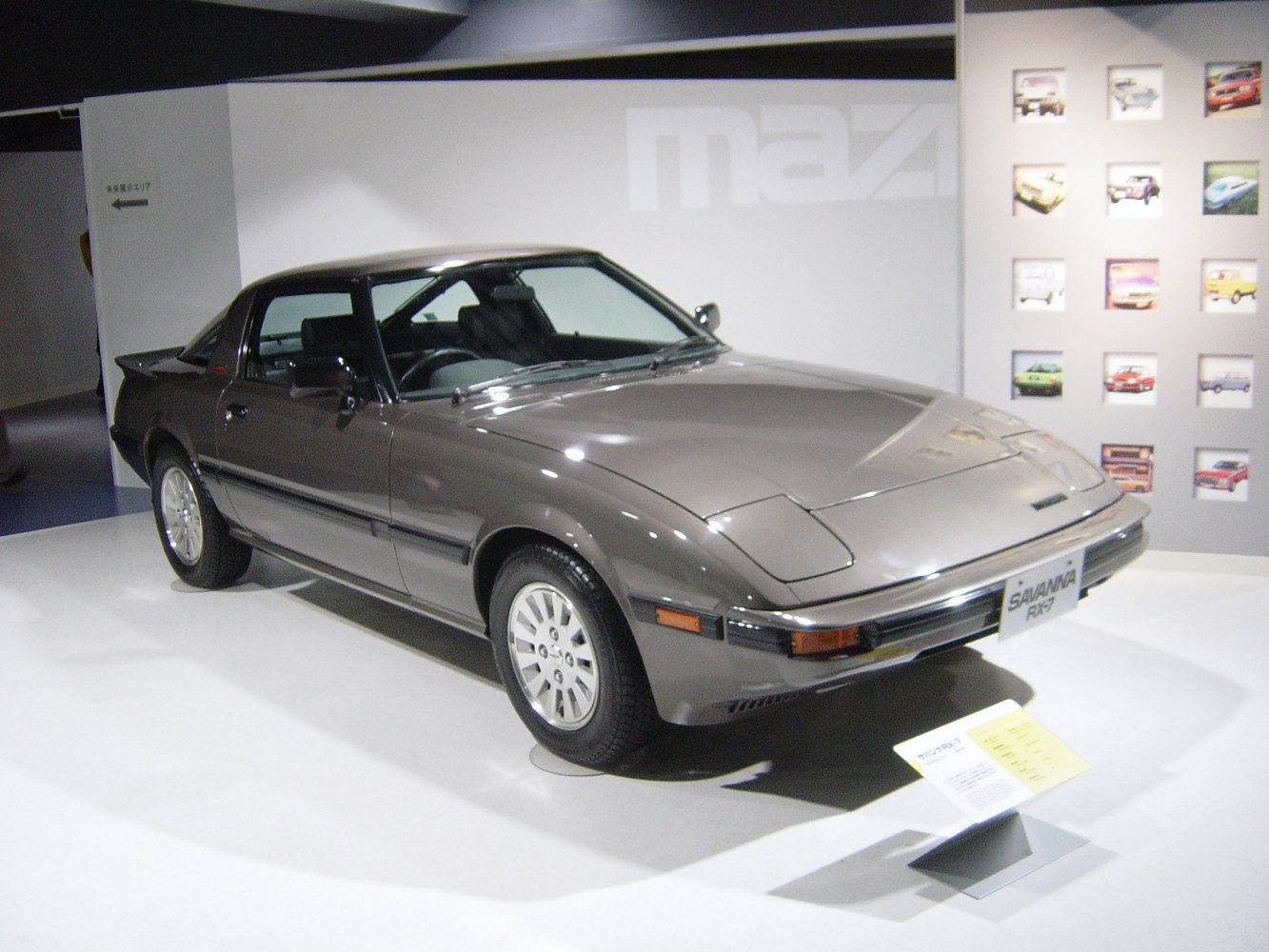Pop-up headlights and rear spoiler on a classic sports coupe