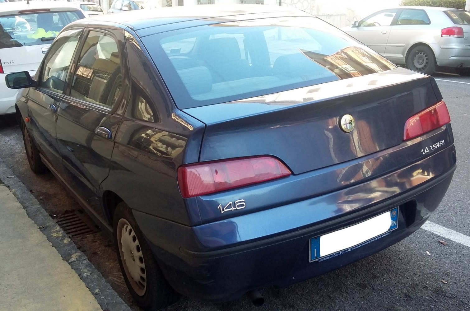 Rear view with 1.4 TSpark badge and distinctive tail lights