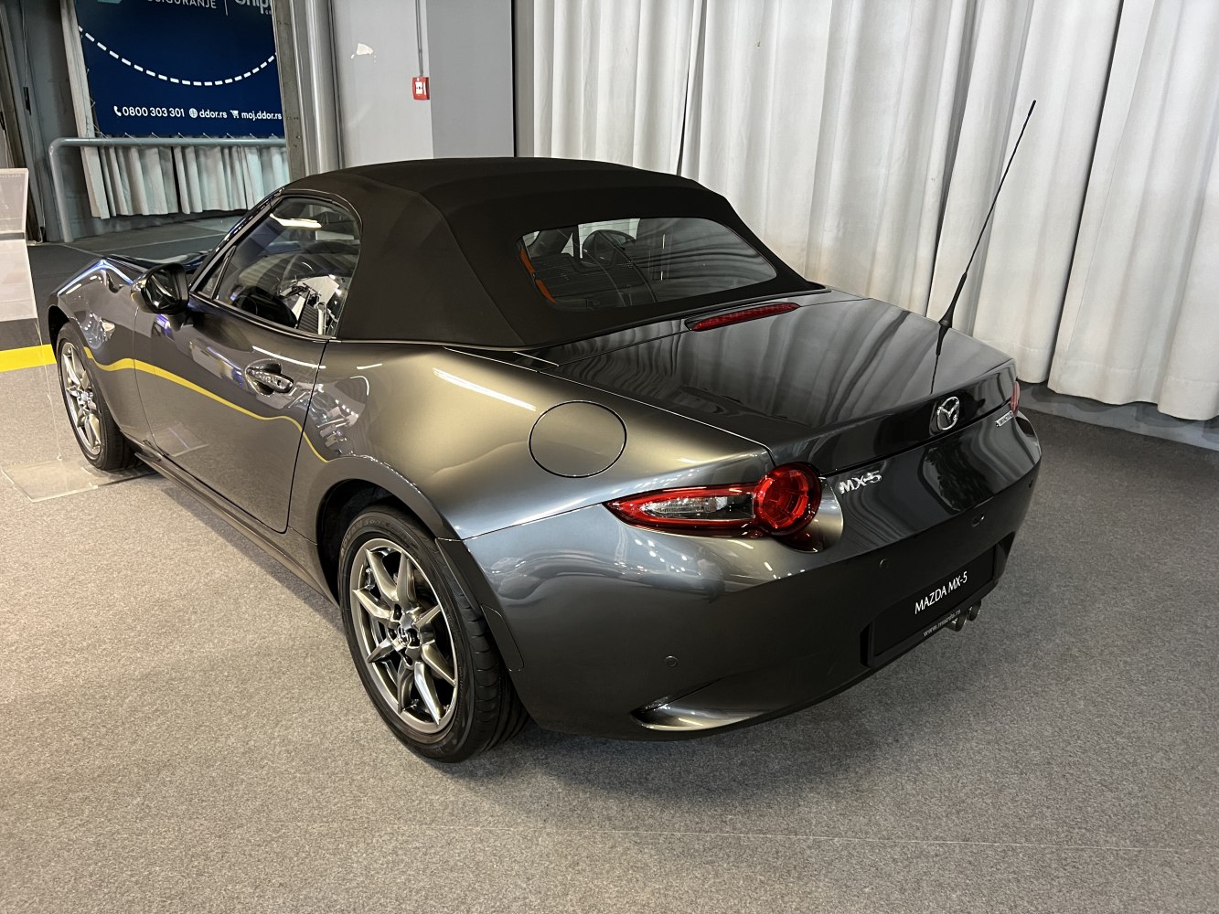 Soft top convertible with sleek rear and alloy wheels