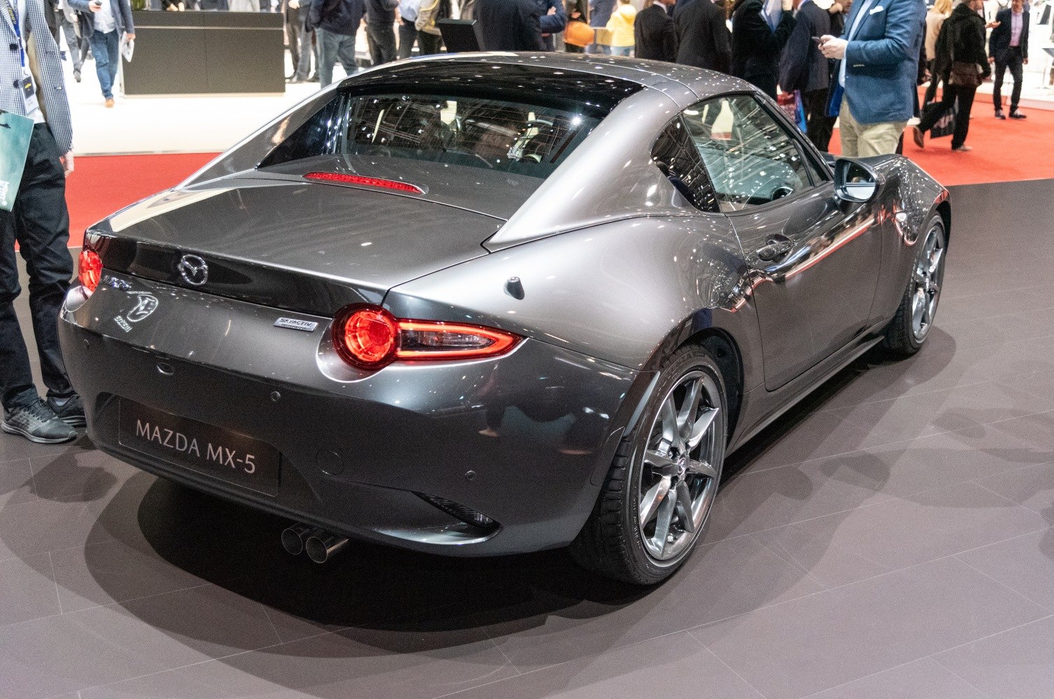Rear and side view with round taillights and hardtop roof