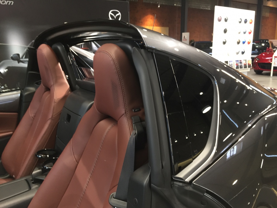 Brown leather seats with black targa roof section