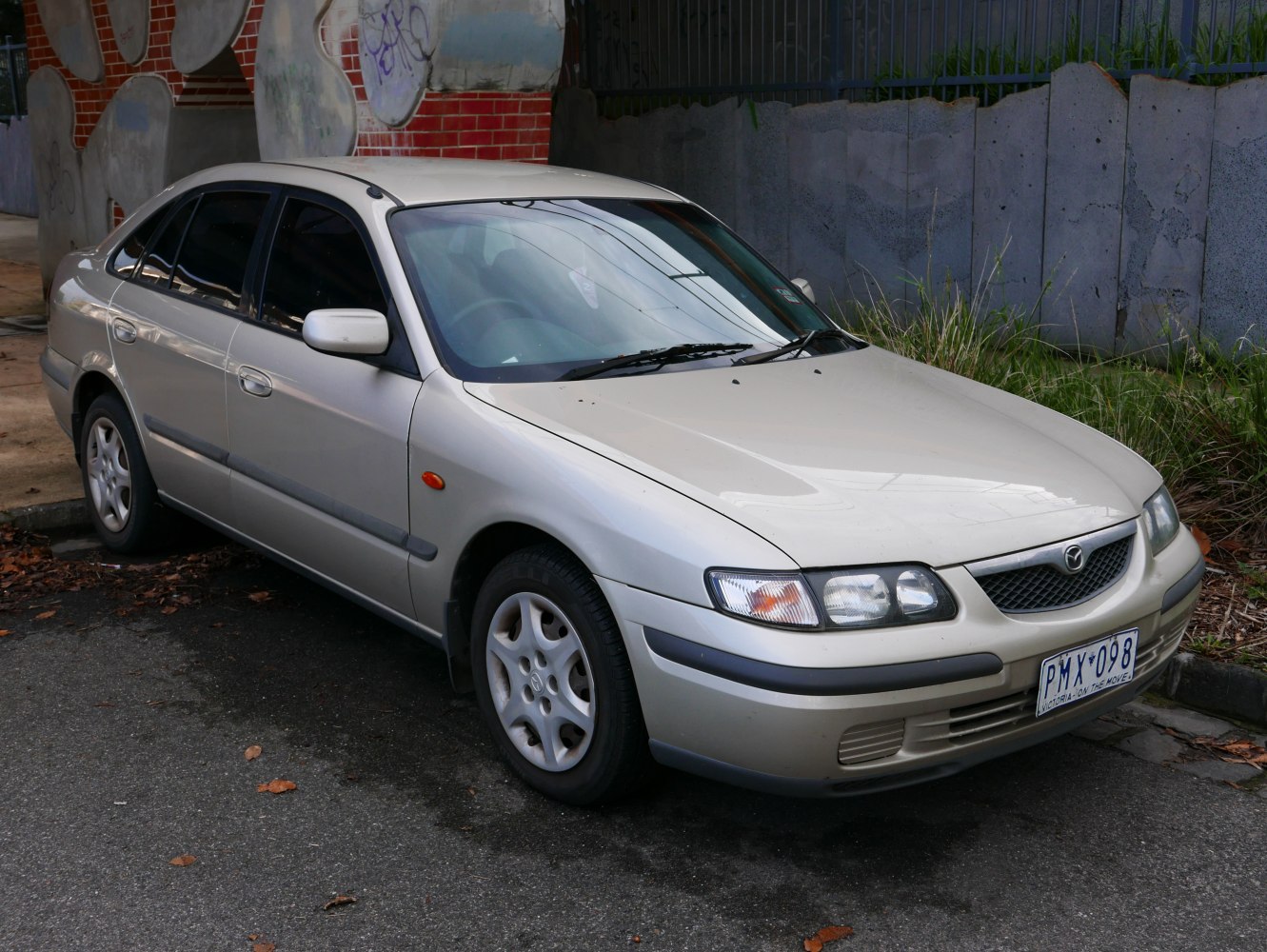 Front angle view showing alloy wheels and headlights.