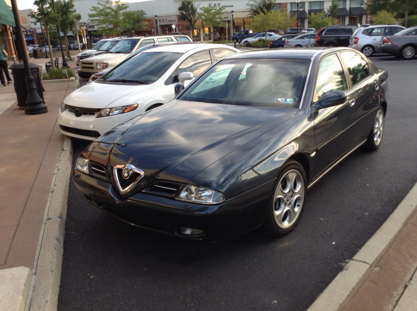 Front view of sedan with triangular grille and dual headlights