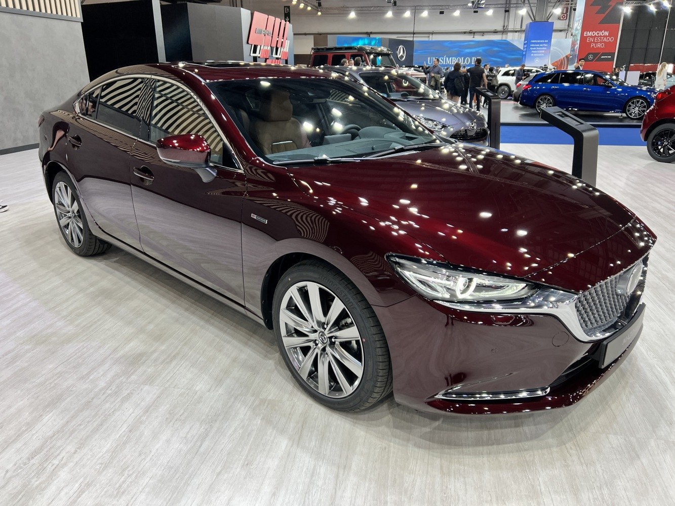 Sedan front with LED headlights and multi-spoke alloy wheels